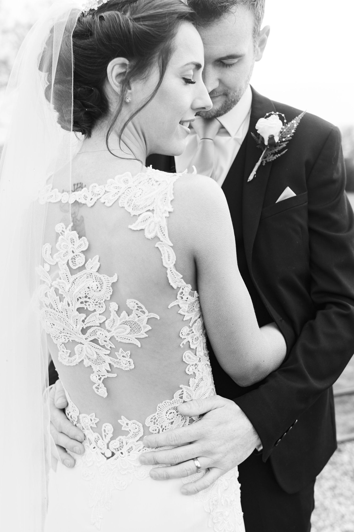 Stunning portrait of bride & groom in gardens at Southwood Hall. by Norwich's best wedding photographer Faye Amare