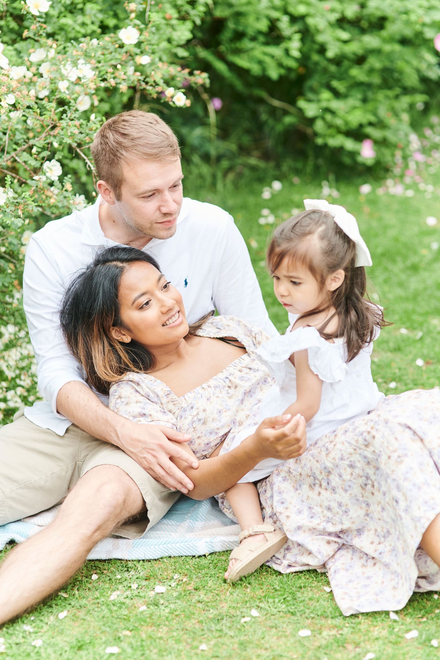 family photoshoot at Peter Beales rose garden in Norfolk. by Norwich's award winning family photographer Faye Amare